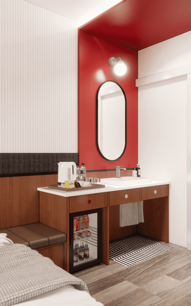 Modern hotel-style bathroom with wooden vanity, mirror, and beverage fridge in Airbnb renovation room.
