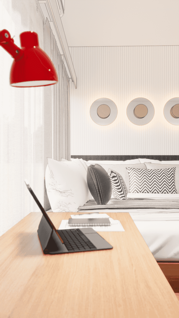 โต๊ะทำงานและเตียงในห้องพักปรับปรุงใหม่สำหรับ Airbnb.